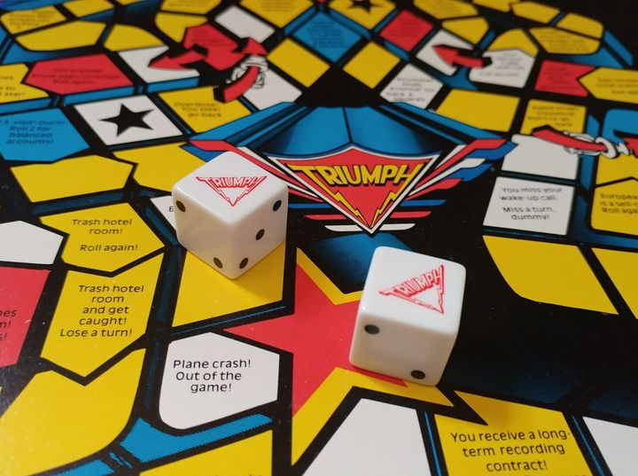 TRIUMPH: JUST A GAME - The Game - High Roller Games Inc
